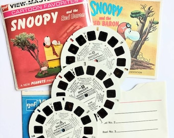 B544 SNOOPY and the Red Baron A New Peanuts Packet gaf VIEW-MASTER 3 Reels & Booklet