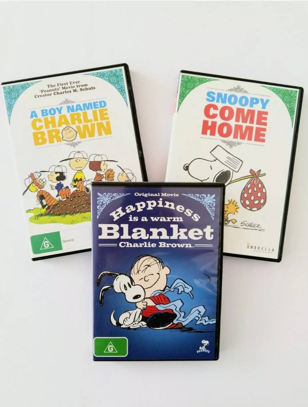 A Boy Named Charlie Brown/snoopy Come Home/happiness is a Warm Blanket