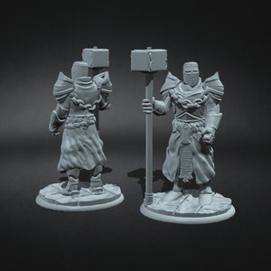 May include: A grey plastic miniature figurine of a knight wearing armour and holding a large hammer. The knight is standing on a round base.