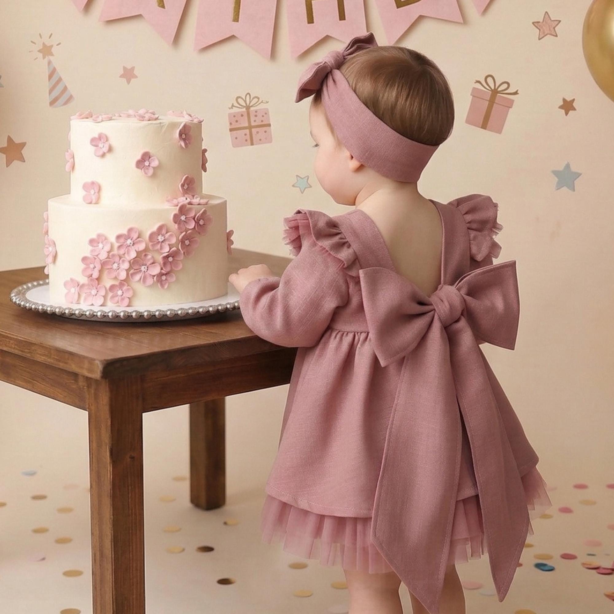 Elegant purple tulle dress for baby girl with big bow