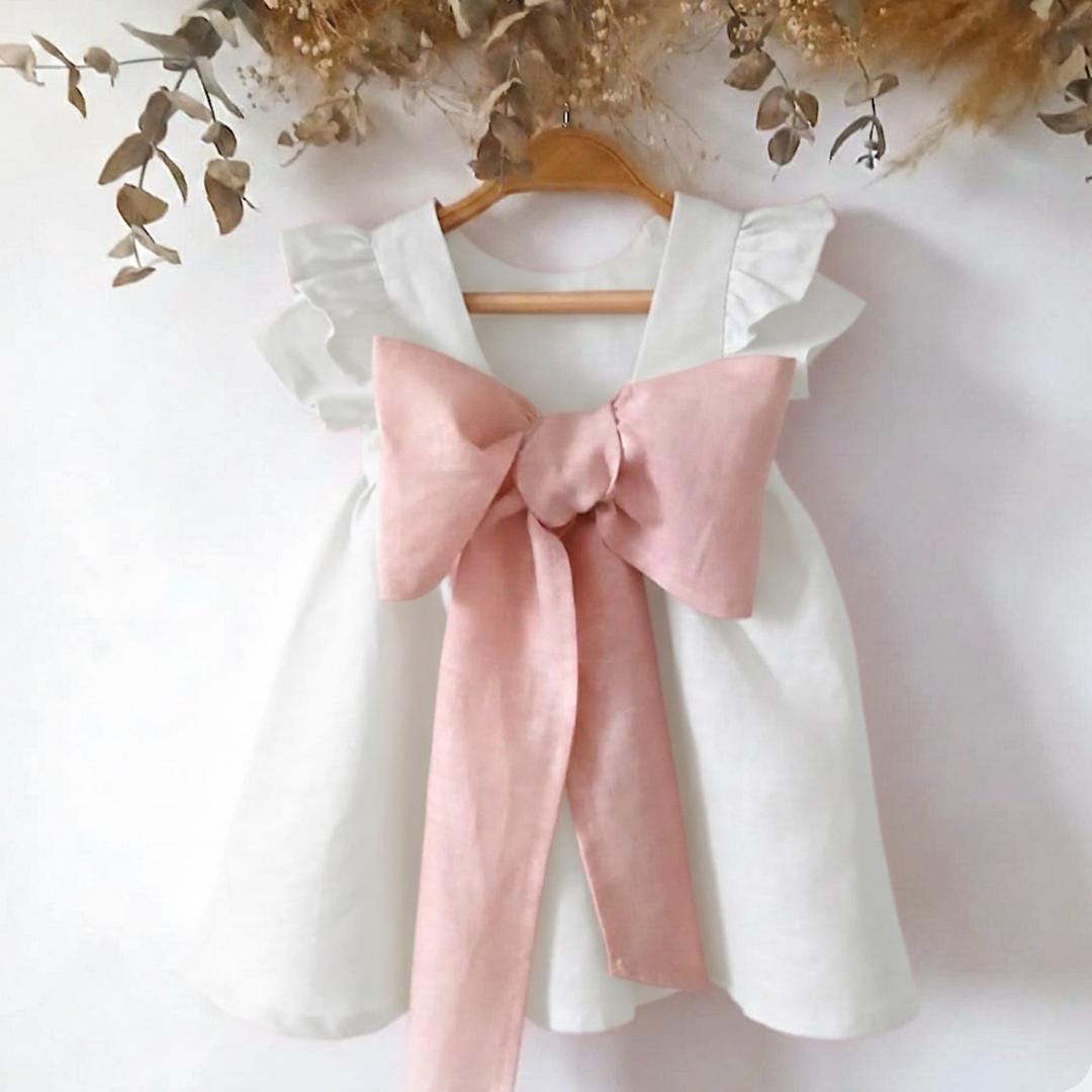 white dress with pink ribbon The Pink Ribbon Dress Extra small / Polyester