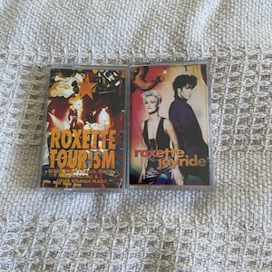 Cassette Roxette,Ace Of Base stickers on the spine of cardboard sleeves