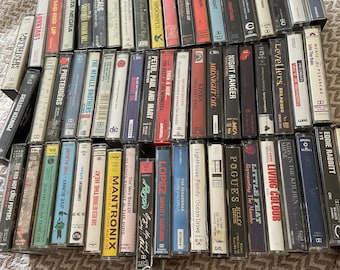 L-R Cassette tapes various artists Inc. Pulp,Midnight Oil,Lighthouse Family,Red Hot Chilli Peppers,Dan Reed,Poison,Matt Bianco,Monkees,