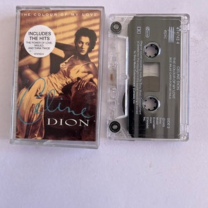 May include: A cassette tape case with a photo of Celine Dion on the front. The case is clear plastic and the tape is labeled "The Colour of My Love" and "Celine Dion". The tape includes the hits "The Power of Love", "Misled", and "Think Twice".