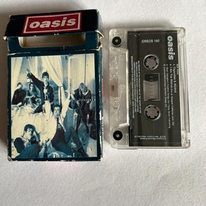 Oasis Cigarettes and Alcohol Worn Cover Cassette Tape