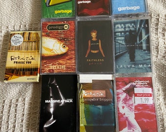 Cassette Singles some signs of stickers on cardboard sleeves,Garbage,Faithless,Prodigy,Fat boy Slim,Massive Attack,Chemical Brothers