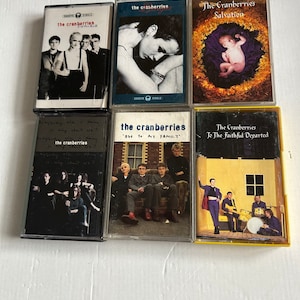 U2,OMD,Orchestral Manöver Im Dunkeln,Omd,Cranberrys,Chinesische Krise,Yello Singles einige Aufkleber auf dem Rücken der Papphüllen