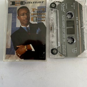 May include: A cassette tape with a clear plastic case. The tape is labeled "Please Hammer Don't Hurt 'Em" by M.C. Hammer. The tape is a Capitol Records release.