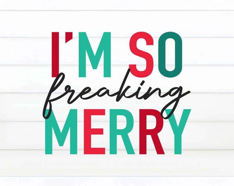 May include: A white wood background with the text "I'M SO freaking MERRY" in red, teal, and black lettering.