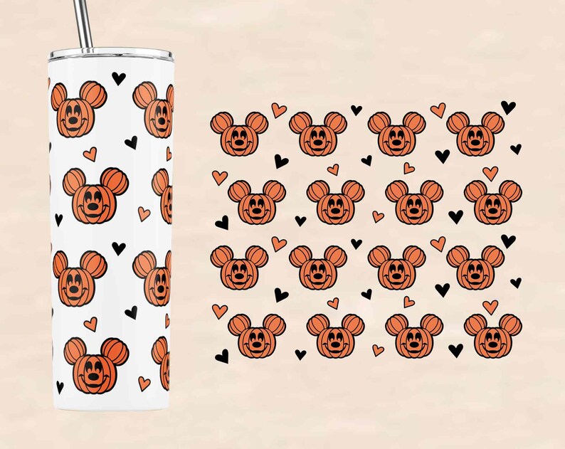 May include: A white stainless steel tumbler with a black straw. The tumbler has a repeating pattern of orange pumpkin Mickey Mouse heads and black hearts.