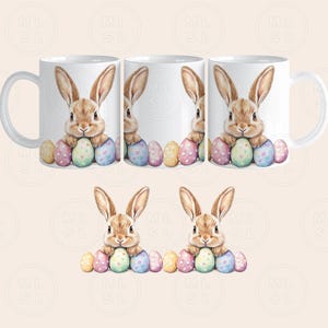 May include: Set of four white ceramic mugs with a brown bunny rabbit holding colorful Easter eggs. The mugs have a handle on the right side.