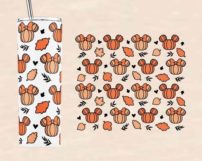 May include: A white tumbler with a straw features a pattern of orange pumpkins with bows and black leaves. The tumbler is surrounded by a white background.