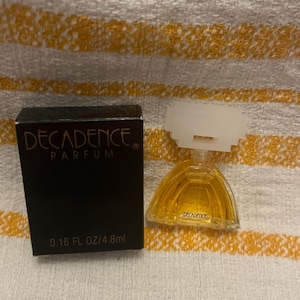 Decadence Parfum vintage minature in original box still with contents 4.8 ml.