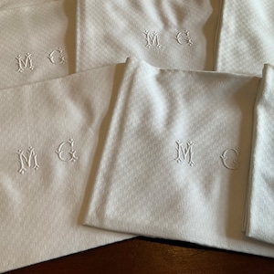 Set of nine vintage french hand stitched hand embroidered monogrammed damask cotton napkins