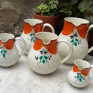 set of five vintage french handpainted jugs.