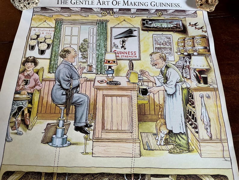May include: An illustration titled "The Gentle Art of Making Guinness" depicts a pub scene. A bartender pours a pint of Guinness, while patrons enjoy the stout. The artwork features vintage advertisements and a cat.