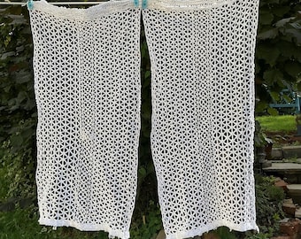 A pair of vintage french cotton work curtain panels