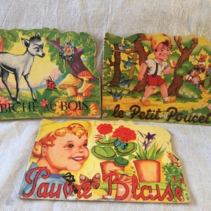 Set of three vintage french children’s books, le petit poucet, la biche au Bois and the pauvre blaise absolutely adorable beautiful pictures