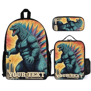 May include: A backpack, pencil case, and lunch bag set featuring a teal Godzilla design against a fiery orange and yellow background. The backpack and lunch bag have the text "YOUR TEXT" at the bottom. The pencil case has the text "YOUR TEXT" at the top.
