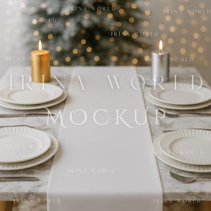 May include: A table setting with white plates, silverware, and a white table runner. Gold and silver candles are lit on the table. The background is blurred with a Christmas tree and bokeh lights. The text "IRINA WORLD MOCKUP" is overlaid on the image.
