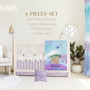 May include: A four-piece baby crib bedding set featuring a light blue and purple color scheme with a galaxy and planets design. The set includes a light fleece blanket, a decorative pillow, a fitted sheet, and a 3-sided skirt. The pillow features the text "Wherever I go, she goes". The blanket features a character from the Star Wars franchise, a galaxy design, and the name "Brianna".