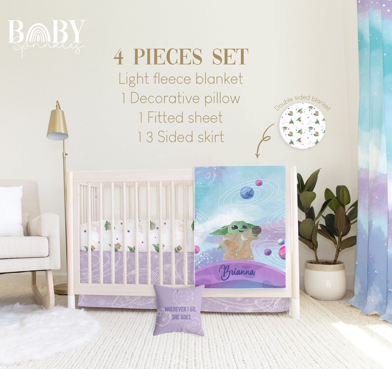 May include: A four-piece baby crib bedding set featuring a light blue and purple color scheme with a galaxy and planets design. The set includes a light fleece blanket, a decorative pillow, a fitted sheet, and a 3-sided skirt. The pillow features the text "Wherever I go, she goes". The blanket features a character from the Star Wars franchise, a galaxy design, and the name "Brianna".