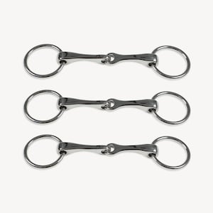 May include: Three stainless steel horse bits are displayed against a white background. Each bit has a central mouthpiece connected to two circular rings. The bits are designed for use in equestrian activities.