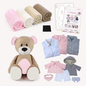 May include: A soft teddy bear with pink details is positioned near rolled fabric in shades of pink, white, beige, and brown. Sewing patterns and doll clothing, including shirts and shorts, are also shown.