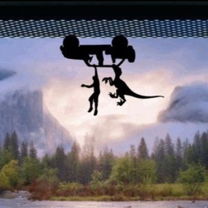 Tiny Man and Raptor Hanging from Four Door Car Decal