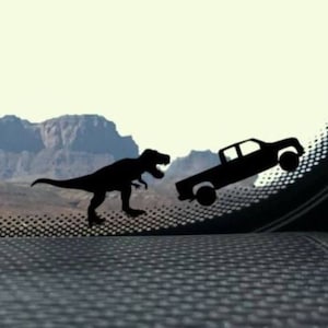 Tiny T-Rex Chasing Truck Decal
