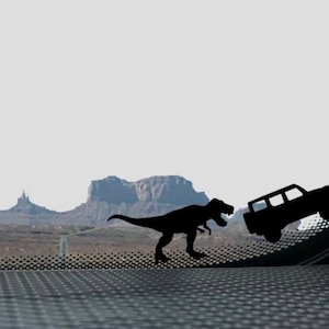 Tiny T-Rex Chasing Four Door Bronco Decal