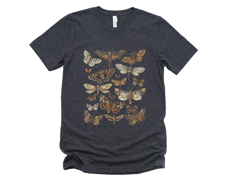 May include: A dark heather grey t-shirt with a vintage illustration of various moths and butterflies in shades of brown, orange, and white.