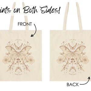 May include: A beige canvas tote bag with a brown butterfly and floral design. The text "Stay Wild Moon Child" is printed on the bag. The bag has two handles and is printed on both sides.