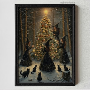 May include: A framed print depicts a Christmas scene with witches and black cats in a snowy forest. The witches, in black dresses and hats, gather around a decorated Christmas tree. A star shines atop the tree, and several black cats are scattered around the scene.