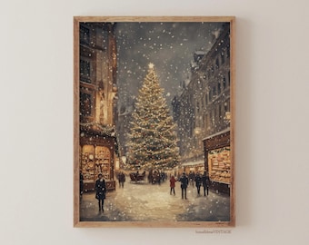 May include: A framed print depicting a snowy Christmas scene. A large, illuminated Christmas tree is the focal point of a European street, with buildings and people surrounding it. The artwork has a vintage style, with warm colours and a festive atmosphere.