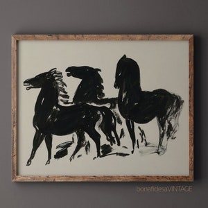 May include: Black and white abstract painting of three horses in a framed print. The horses are depicted in a stylized, minimalist style.