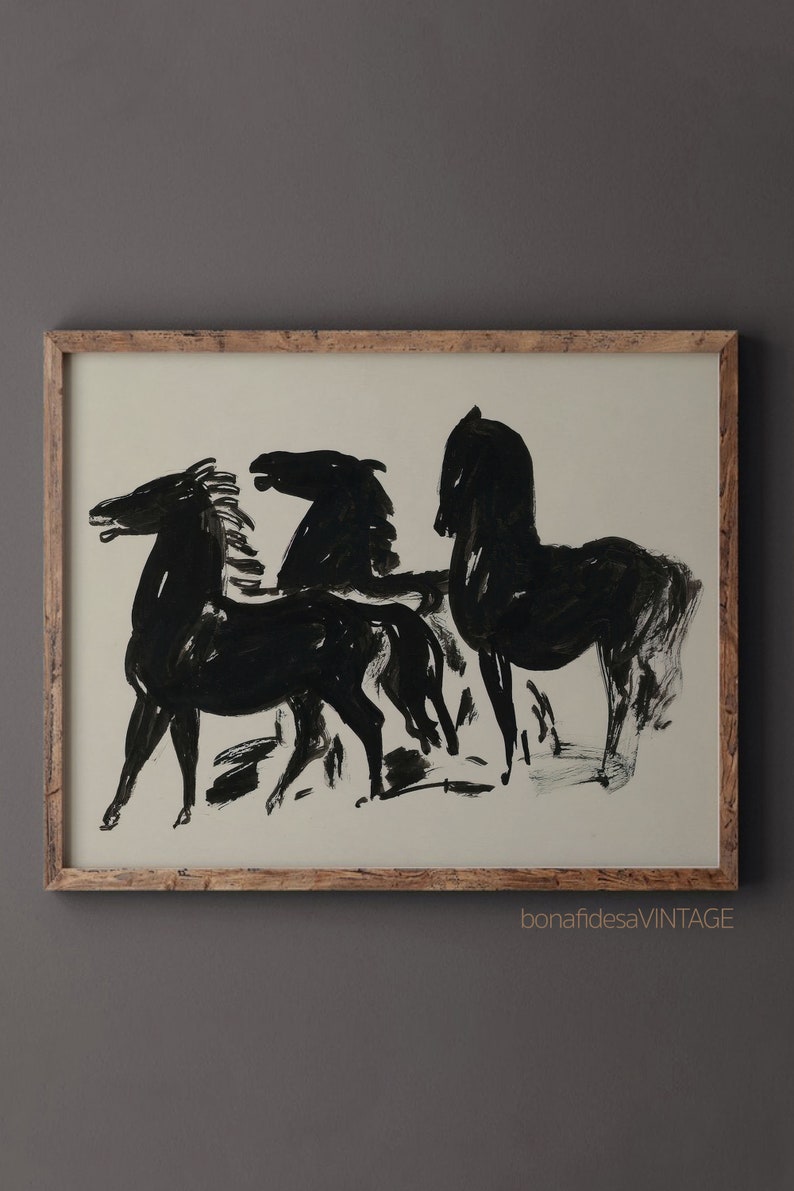 May include: Black and white abstract painting of three horses in a framed print. The horses are depicted in a stylized, minimalist style.
