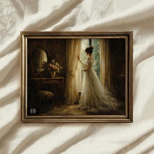 May include: A framed vintage-style painting depicts a woman in a white dress looking out a window. The artwork features a gold frame, a vanity with a mirror, and a bouquet of flowers. The scene is bathed in soft, warm light.