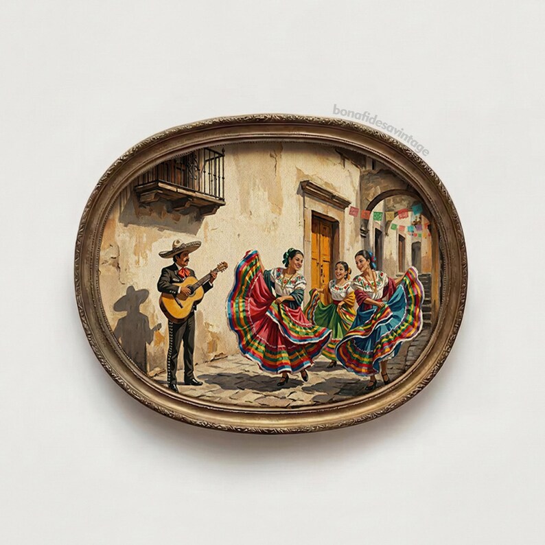 May include: An oval-framed painting depicting a musician in a black charro suit playing a guitar while three individuals in colorful, multi-striped traditional dresses dance on a cobblestone street in front of a beige building with a balcony.