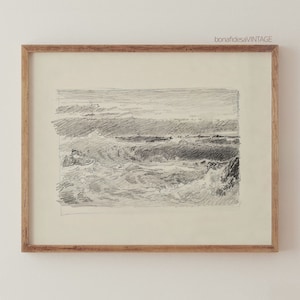May include: A framed black and white pencil drawing of a seascape with waves crashing on the shore. The drawing is in a simple wooden frame.