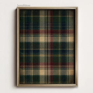 May include: A rectangular wall art print featuring a dark green, navy blue, and deep red plaid tartan pattern with thin yellow accent lines. The print is encased in a thin, metallic gold frame. The text bonafidesa is visible in the top left corner.