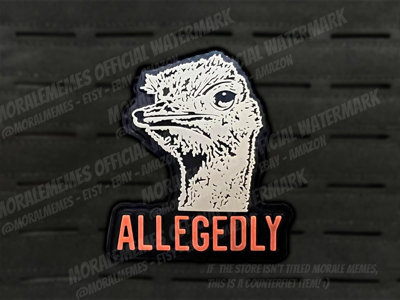 Puede incluir: Un parche blanco y negro con una cabeza de avestruz de dibujos animados y la palabra "ALLEGEDLY" en texto naranja. El parche tiene un borde negro y un fondo blanco.