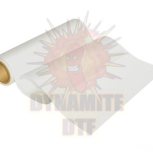 May include: A roll of clear transfer film for use with a DTF printer. The film is rolled up and has a brown core. The film is labeled "Dynamite DTF".