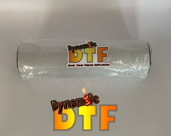 May include: A roll of white heat transfer vinyl with a black and yellow logo that says "Dynamite DTF" and "Make Your Prints Explode!!!"  The roll is wrapped in clear plastic.