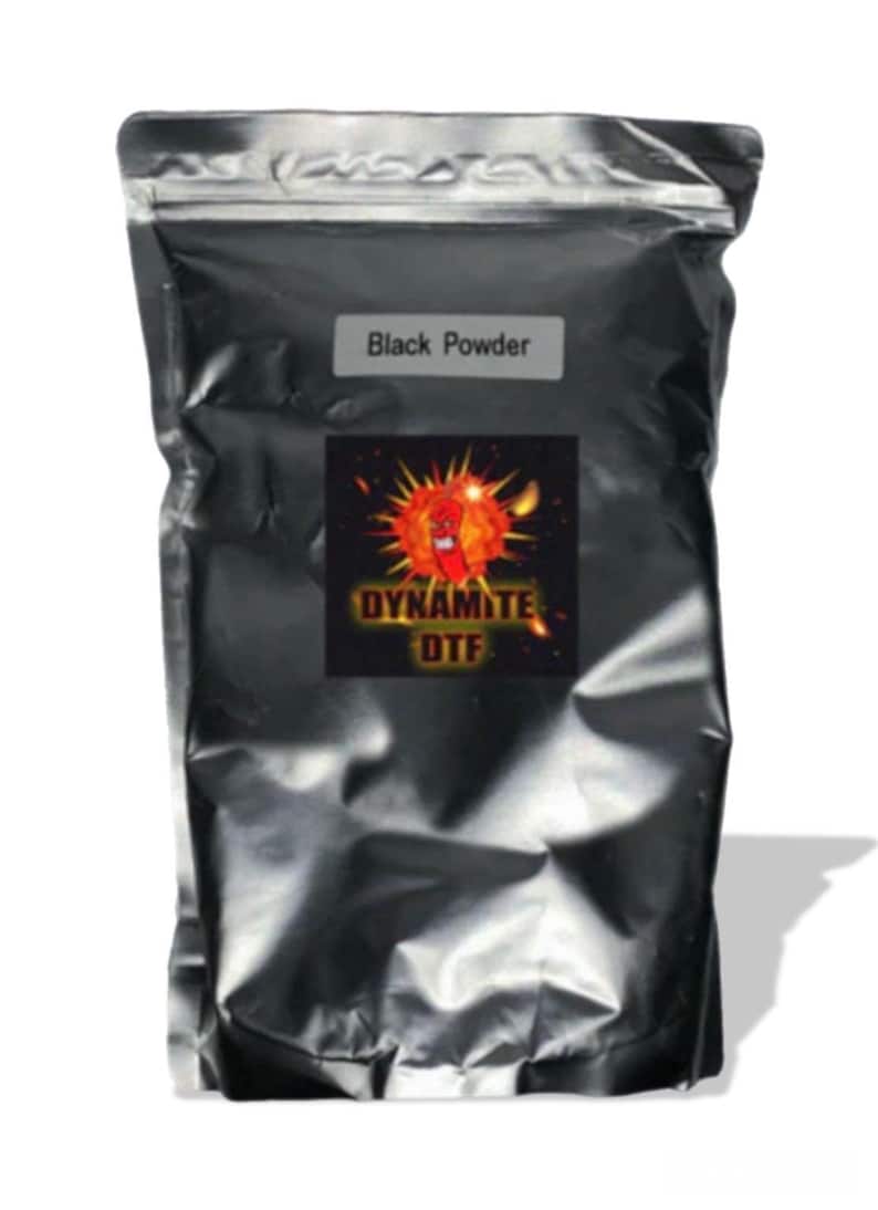 May include: A black bag with a label that says "Black Powder" and a cartoon image of a stick of dynamite with the words "Dynamite DTF".