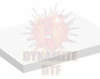 May include: A white rectangular surface with the text "DYNAMITE DTF" in a faded, orange font. A cartoon image of a red chili pepper with a fiery explosion is in the background.