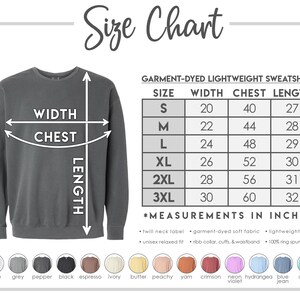 May include: A size chart for a garment-dyed lightweight sweatshirt. The chart shows measurements in inches for sizes S to 3XL. The sweatshirt is a dark gray color. The chart also lists available colors, including white, grey, black, and others.