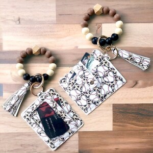 Cartera de béisbol con pulsera y borla
