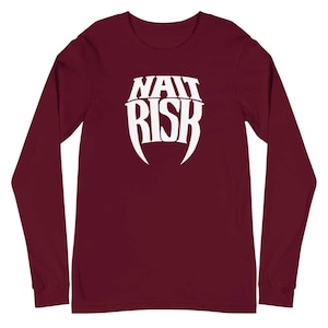 May include: A maroon long-sleeve t-shirt with a white graphic of the text "WAIT RISK" in a stylized font with fangs.