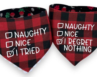May include: Two red and black plaid dog bandanas. One says "Naughty, Nice, I Tried" with a checkmark. The other says "Naughty, Nice, I Regret Nothing" with a checkmark. Both have a white lace trim.